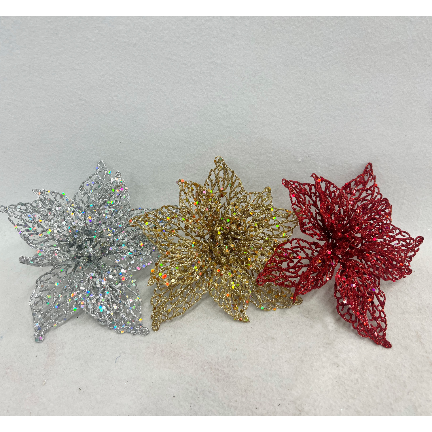 slide 1 of 4, December Home Clip Poinsettia 7 Inch, 7 in