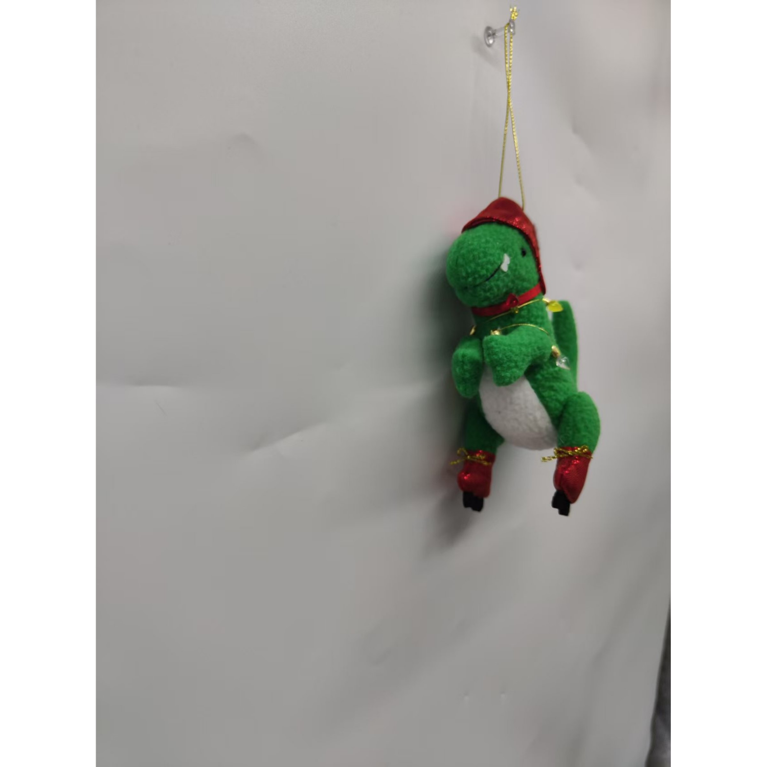 slide 4 of 4, December Home Fabric Sporting Dinosaur Ornament, 2 Assortment, 6 in