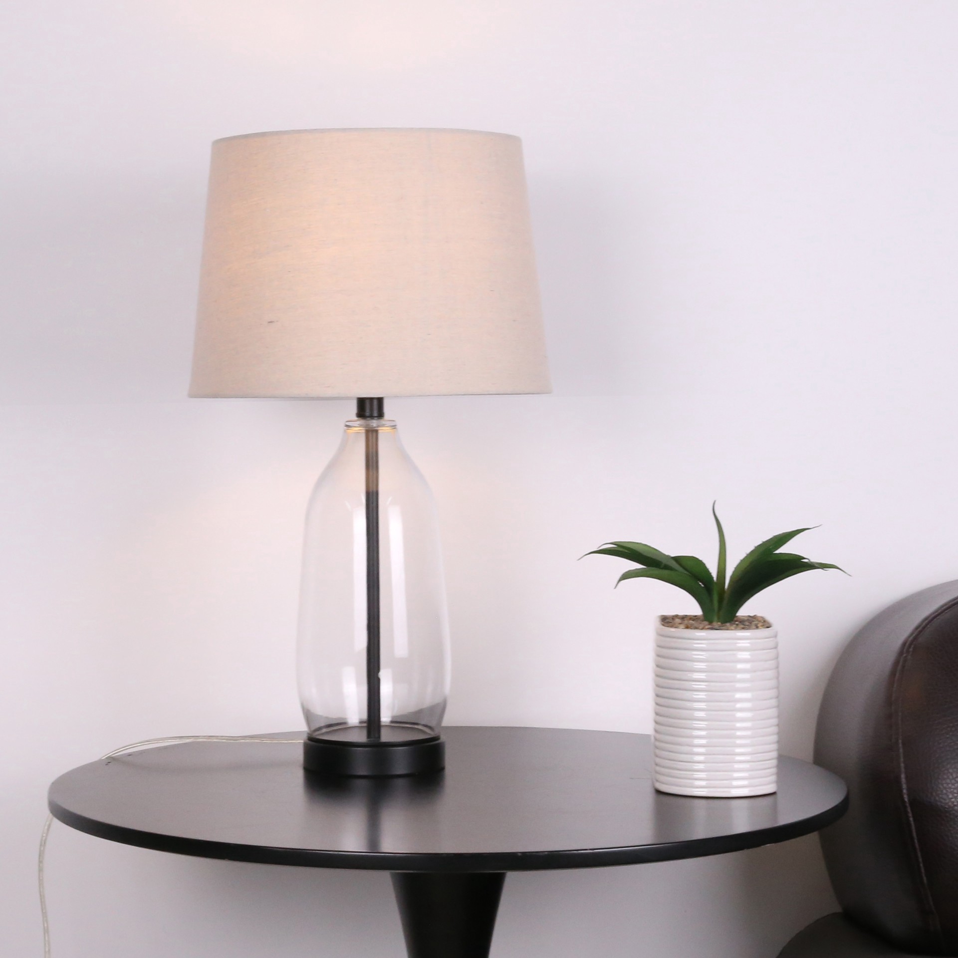 slide 3 of 3, 23" Clear & Black Slim Glass & Metal Table Lamp With Natural Fabric Shade By Ashland, 13 in x 13 in x 23 in