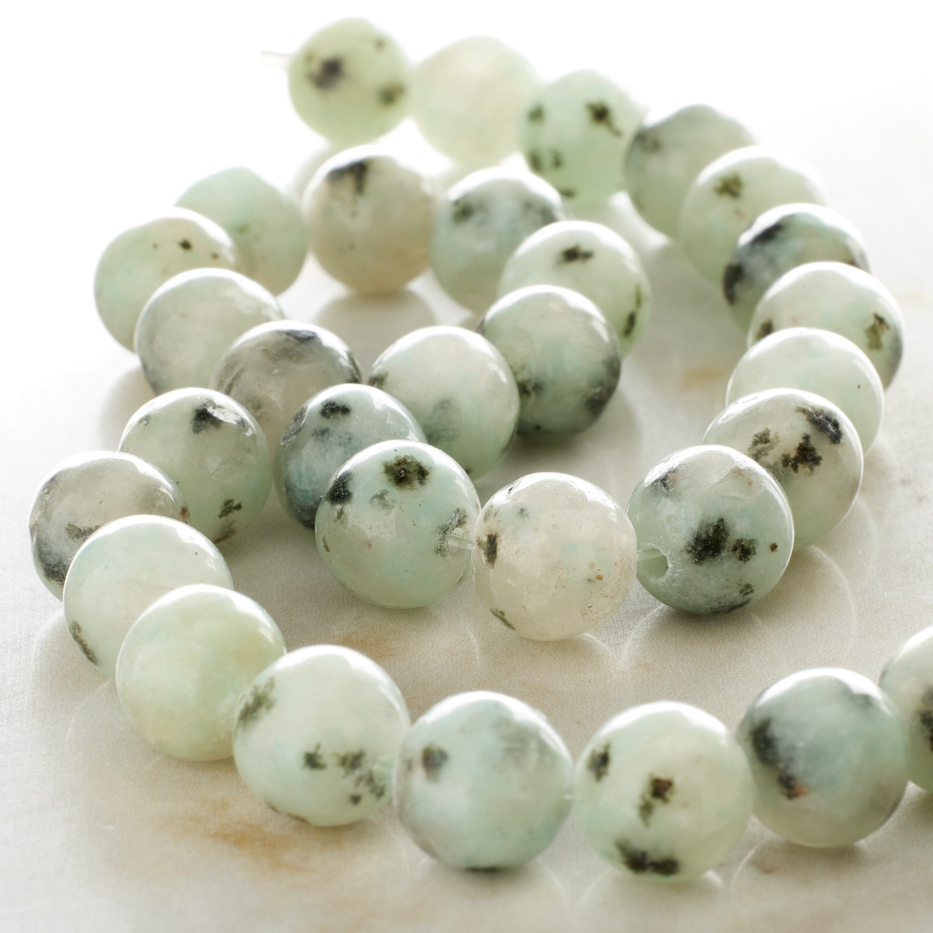 slide 2 of 3, White Kiwi Stone Round Beads, 8mm By Bead Landing, 8mm