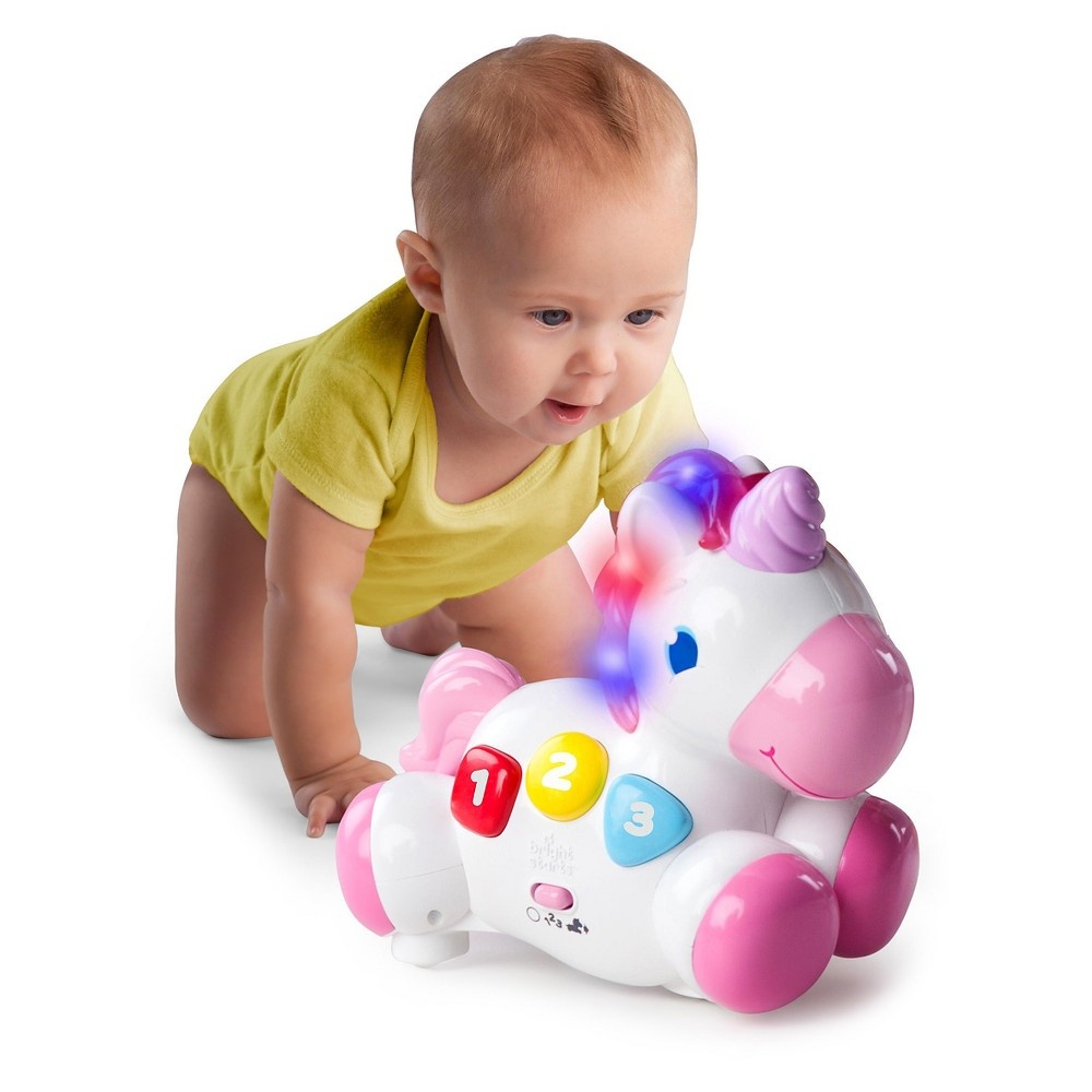 slide 3 of 6, Bright Starts Lights, Lights Baby Rock & Glow Unicorn Toy, 1 ct