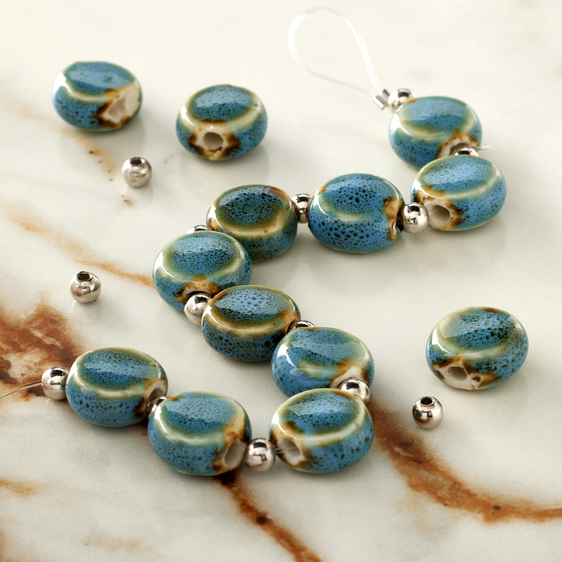 slide 2 of 3, Teal Reactive Glaze Ceramic Flat Round Beads, 11mm By Bead Landing, 11mm