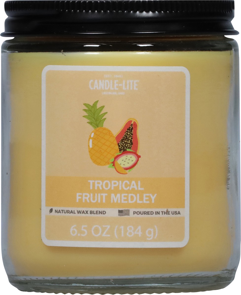 slide 6 of 11, Candle-Lite Tropical Fruit Medley Candle 1 ea, 1 ct