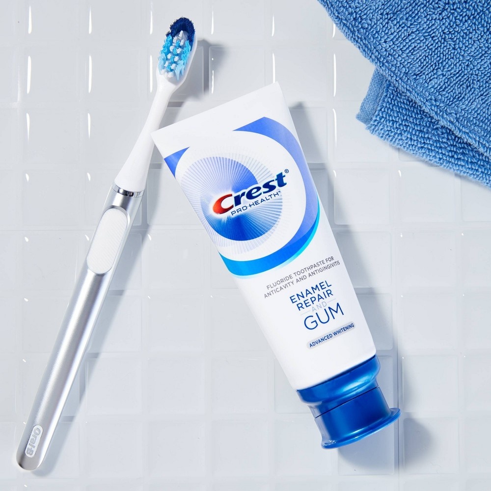 slide 4 of 6, Crest Gum & Enamel Repair Toothpaste for Gum Care Advanced Whitening, 4.1 oz
