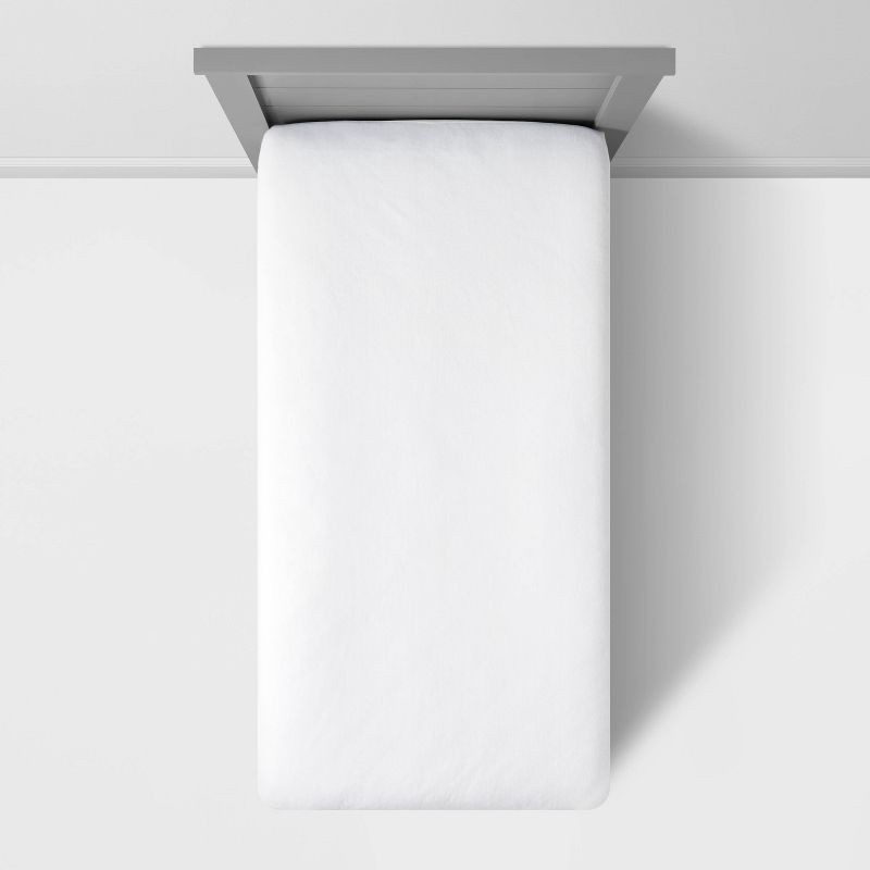 slide 2 of 3, Twin Kids' Mattress Protector Cover - Pillowfort™: Waterproof, OEKO-TEX Certified, 4 Corner Fitted Elastic, White, 1 ct