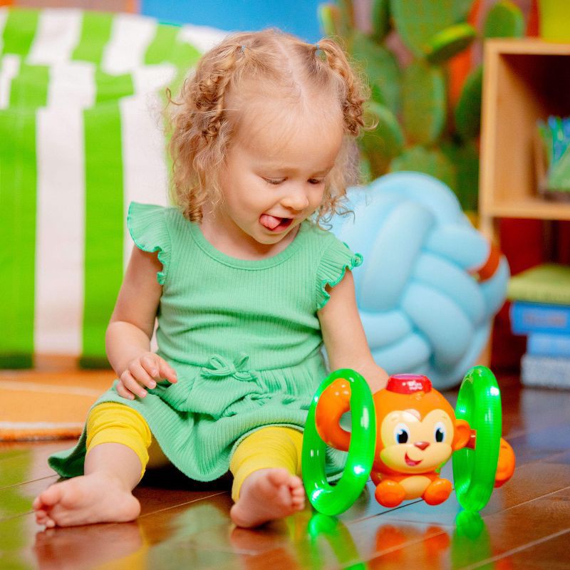 slide 10 of 17, Bright Starts Roll & Glow Monkey, 1 ct