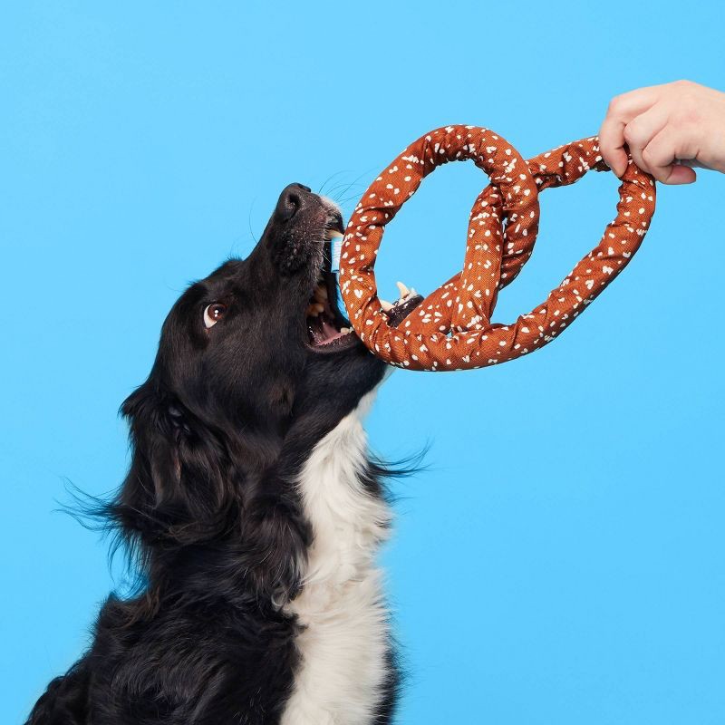 slide 3 of 5, BARK Paula's Pretzel Dog Toy, 1 ct