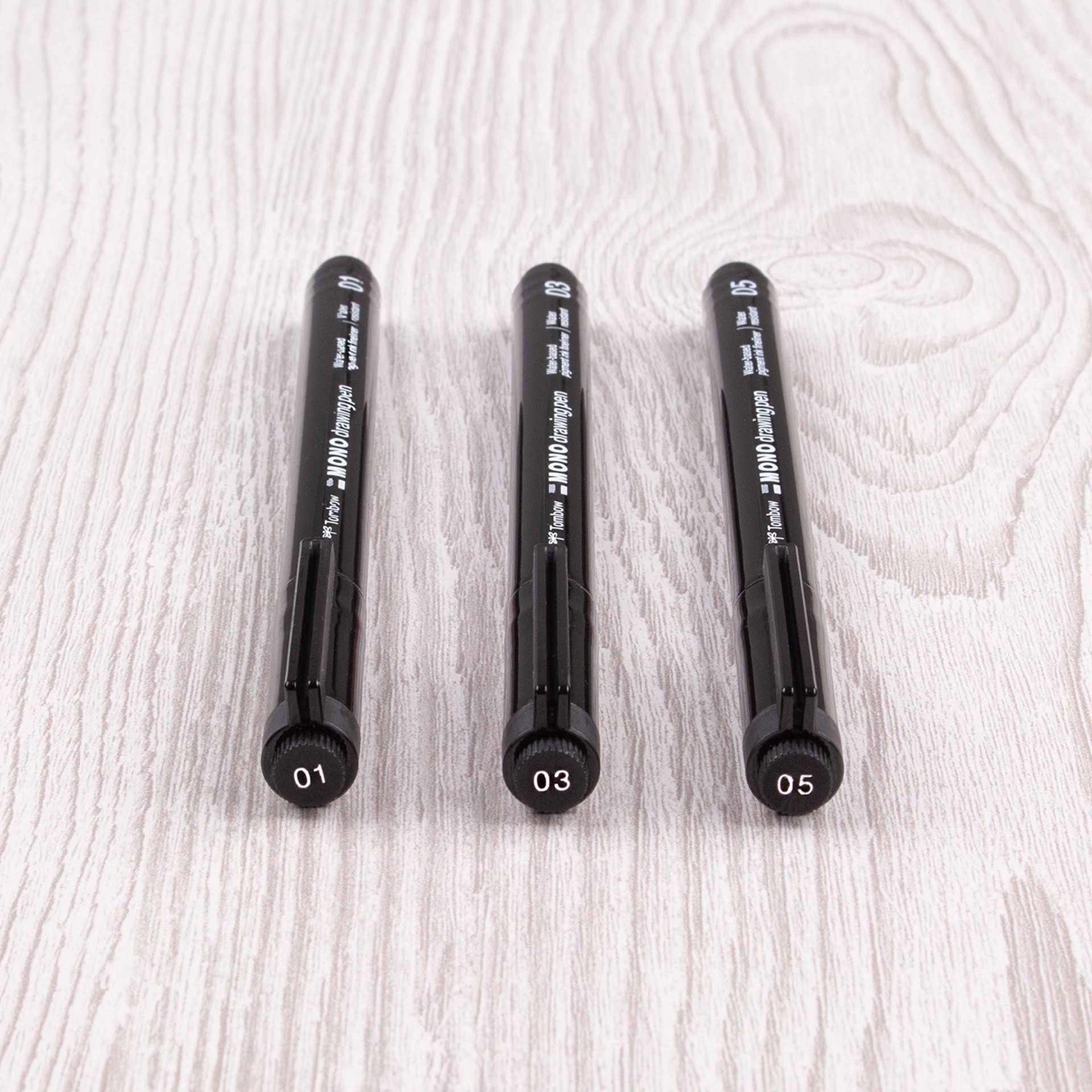 slide 8 of 12, Tombow Mono Drawing Pen Set, includes tip sizes 01, 03 and 05