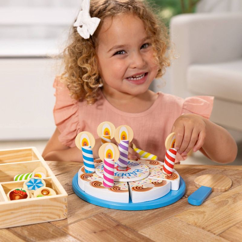 slide 5 of 9, Melissa & Doug Birthday Party Cake - Wooden Play Food With Mix-n-Match Toppings and 7 Candles, 1 ct