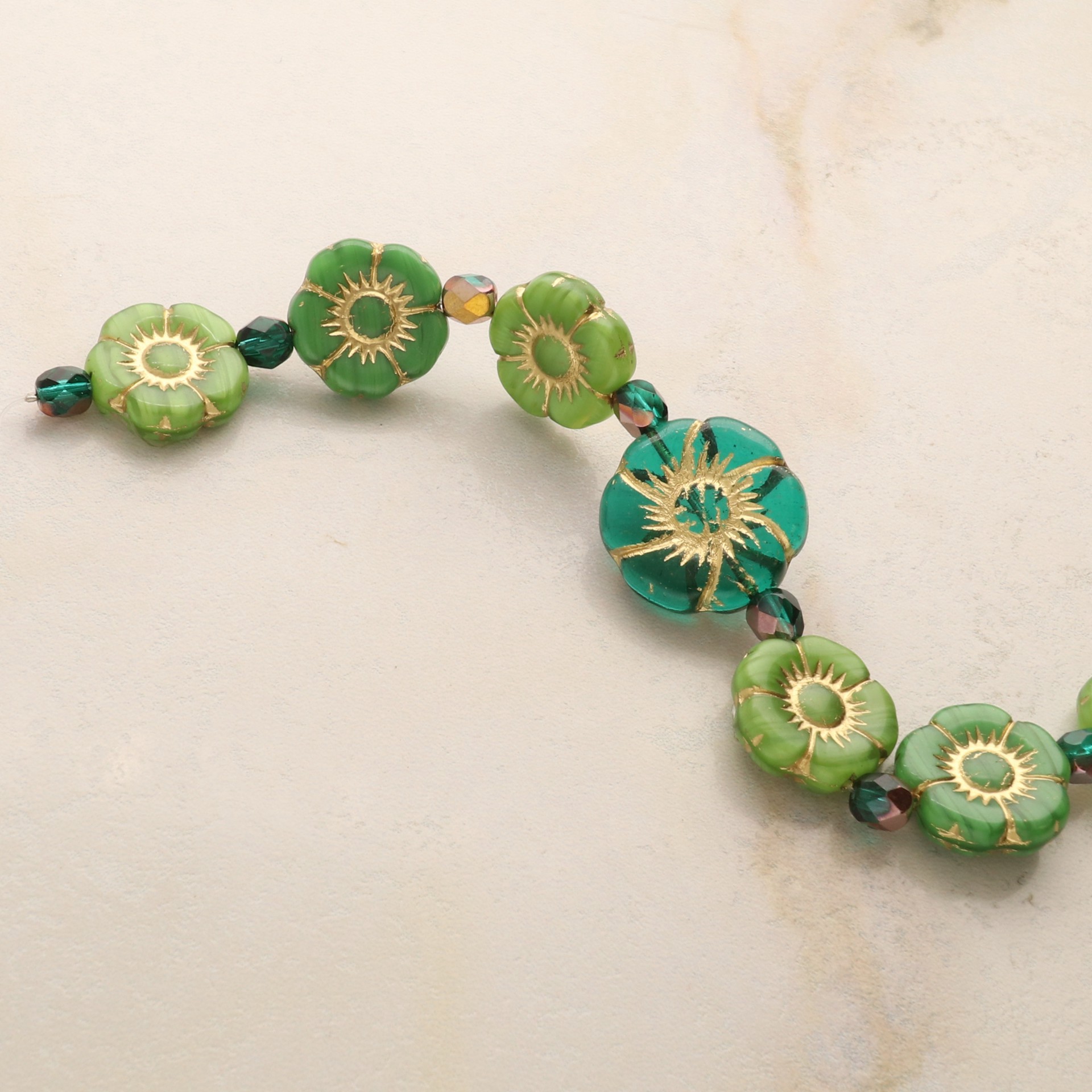 slide 4 of 5, Green Hibiscus Czech Glass Flower Bead Mix By Bead Landing, 5.7mm-21.9mm