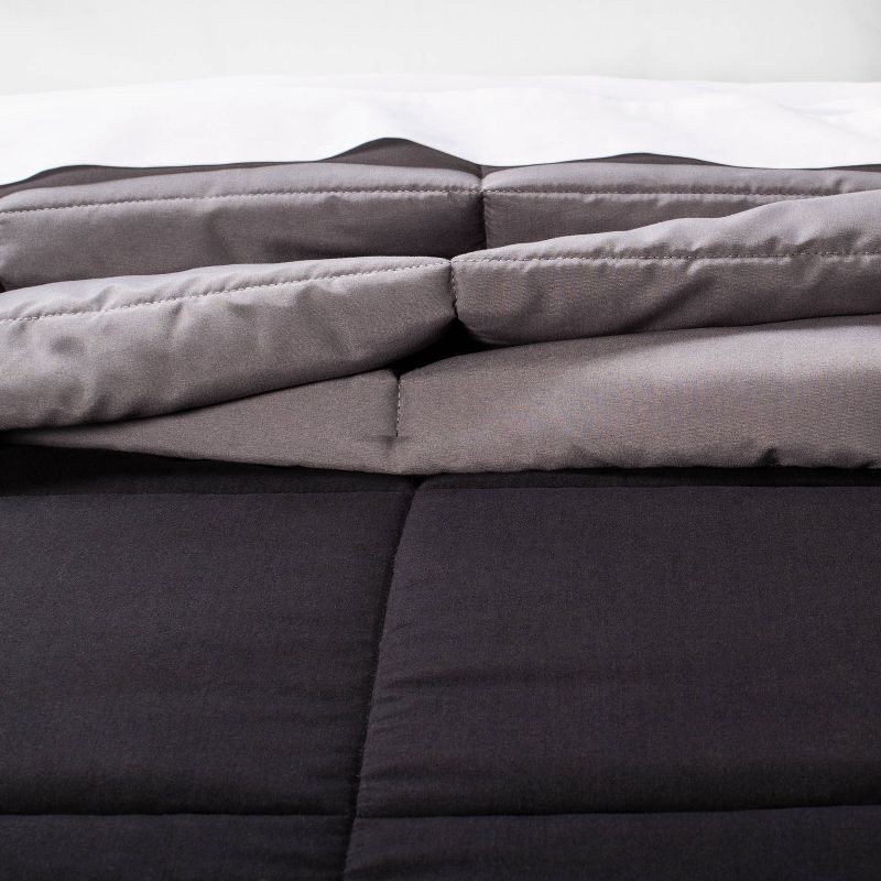 slide 3 of 5, King Reversible Microfiber Solid Comforter Black/Dark Gray - Room Essentials, 1 ct