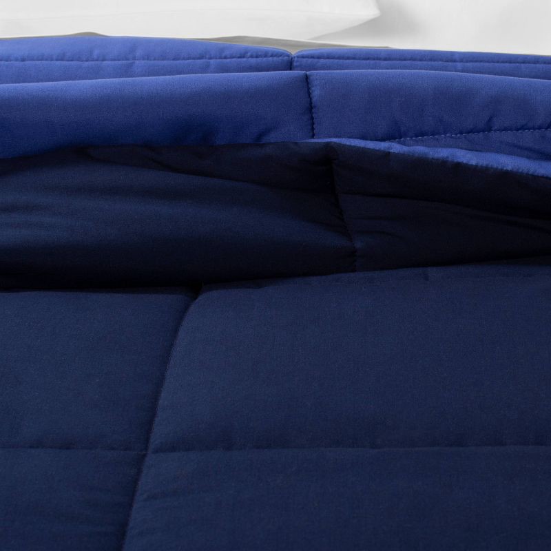 slide 4 of 5, Twin/Twin Extra Long Reversible Microfiber Solid Comforter Navy/Blue - Room Essentials, 1 ct