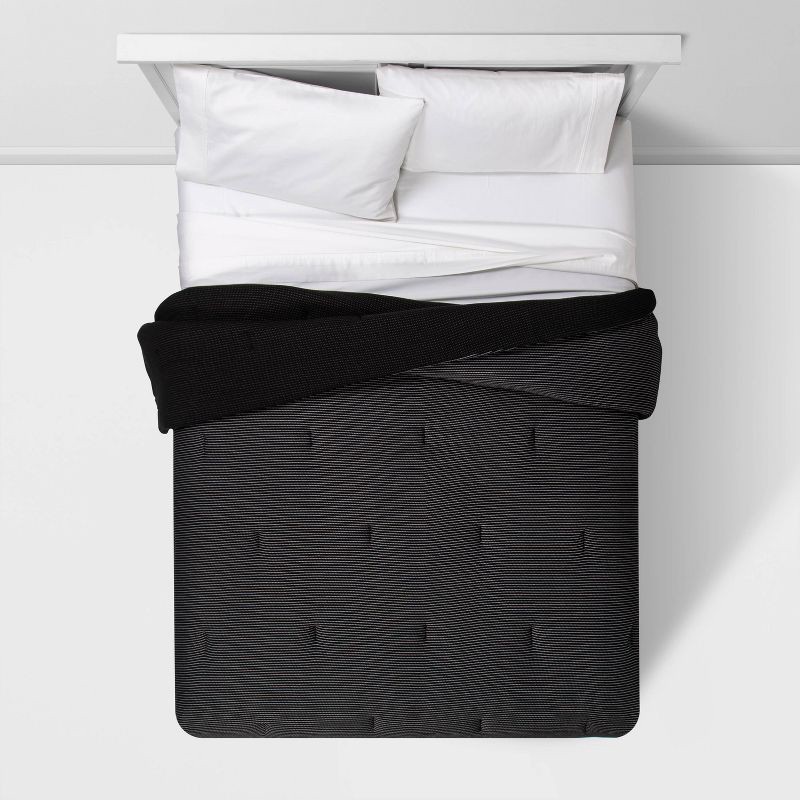 slide 2 of 4, Full/Queen Dobby Jersey Comforter Black - Room Essentials™, 1 ct