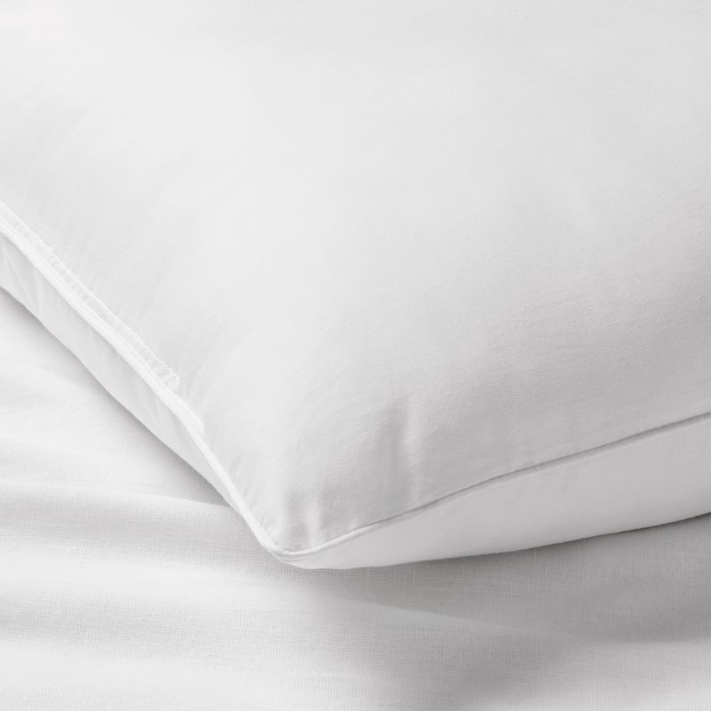 slide 3 of 6, Standard/Queen Medium/Firm Machine Washable Medium Down Alternative Pillow - Casaluna™: Hypoallergenic, 300 Thread Count Cotton Cover, 1 ct