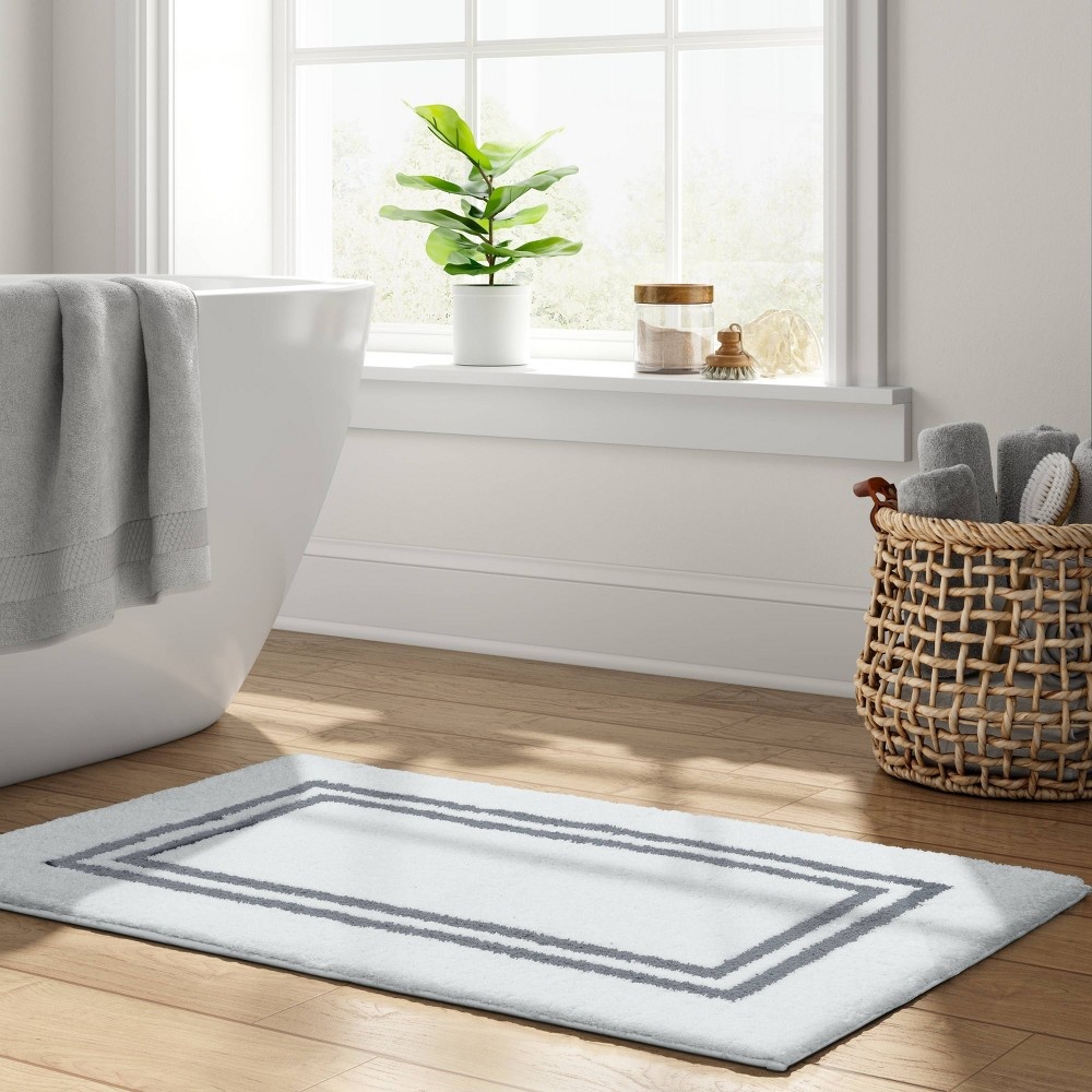 21x34 Bath Rug Dark Gray - Threshold Signature