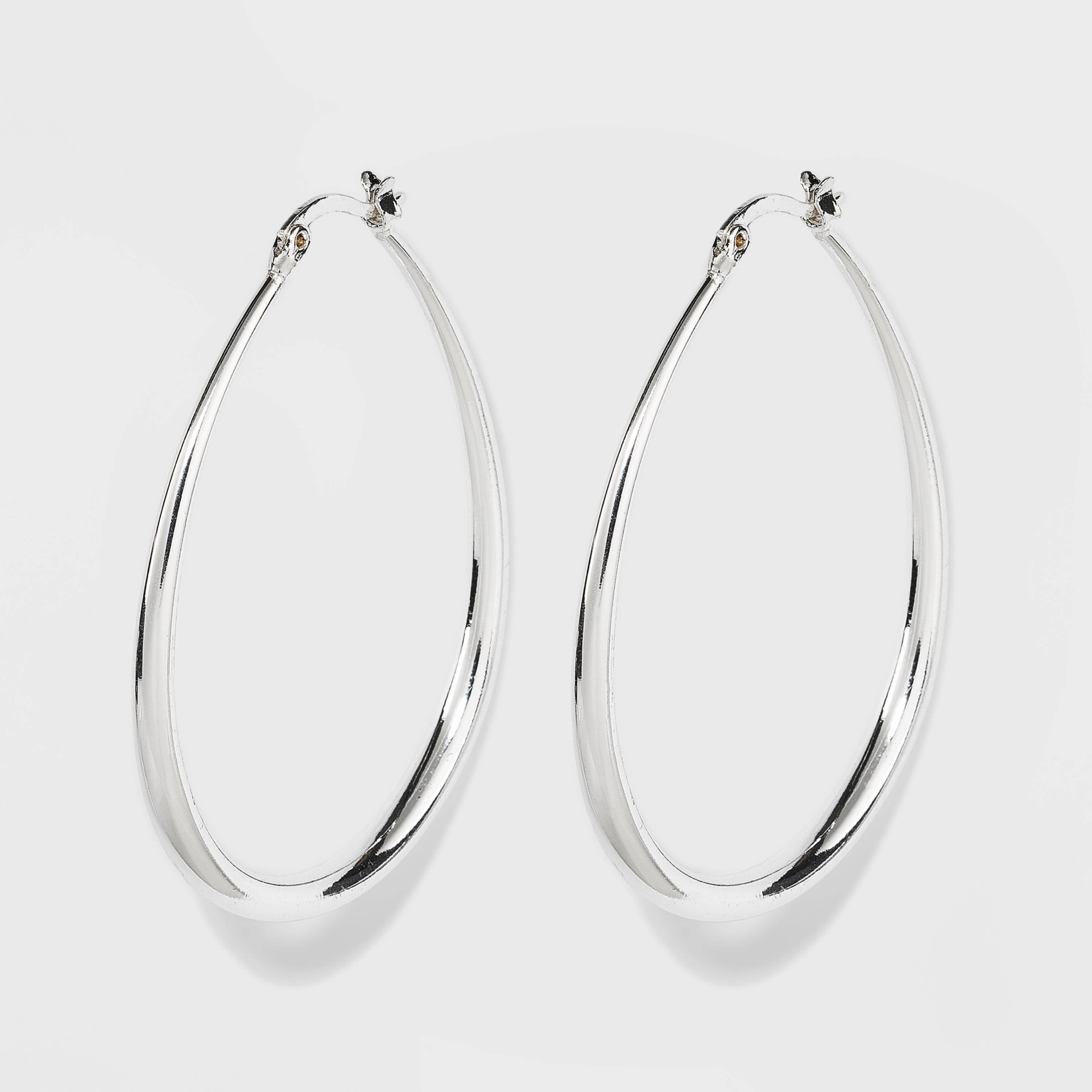 slide 1 of 1, Silver Plated Graduated Oval Hoop Earrings - A New Day Silver, 1 ct