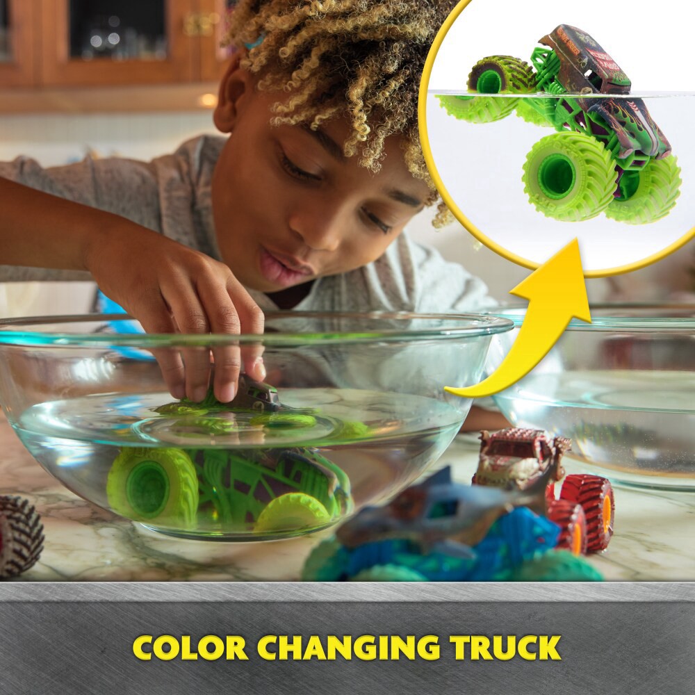 slide 4 of 6, Monster Jam Mud Blasters™ Grave Digger™ Color Change Truck, 1 ct
