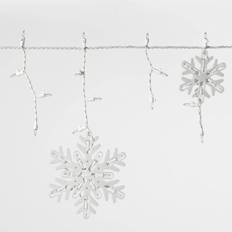 slide 3 of 4, 150ct Incandescent Christmas Icicle Lights with Snowflake Novelty Accent Clear Bulbs with White Wire - Wondershop™, 150 ct