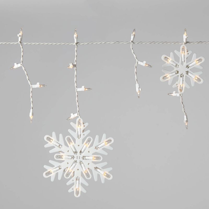 slide 1 of 4, 150ct Incandescent Christmas Icicle Lights with Snowflake Novelty Accent Clear Bulbs with White Wire - Wondershop™, 150 ct