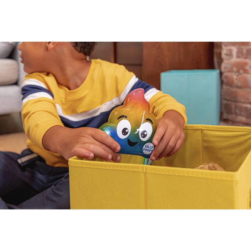 slide 7 of 9, What Do You Meme? Silly Poopy's Hide & Seek: Baby Musical Toy for Problem Solving, Plastic, 1 ct