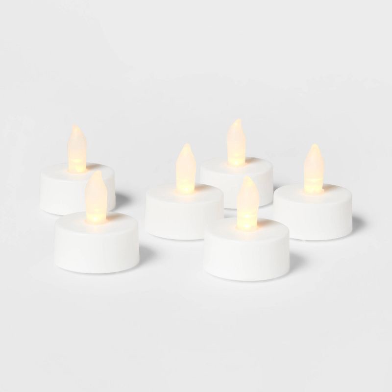 slide 3 of 3, 24ct Twist-Flame LED Tealight Candles (White) - Room Essentials™: Plastic, Battery-Operated, Decorative Tea Lights, 24 ct