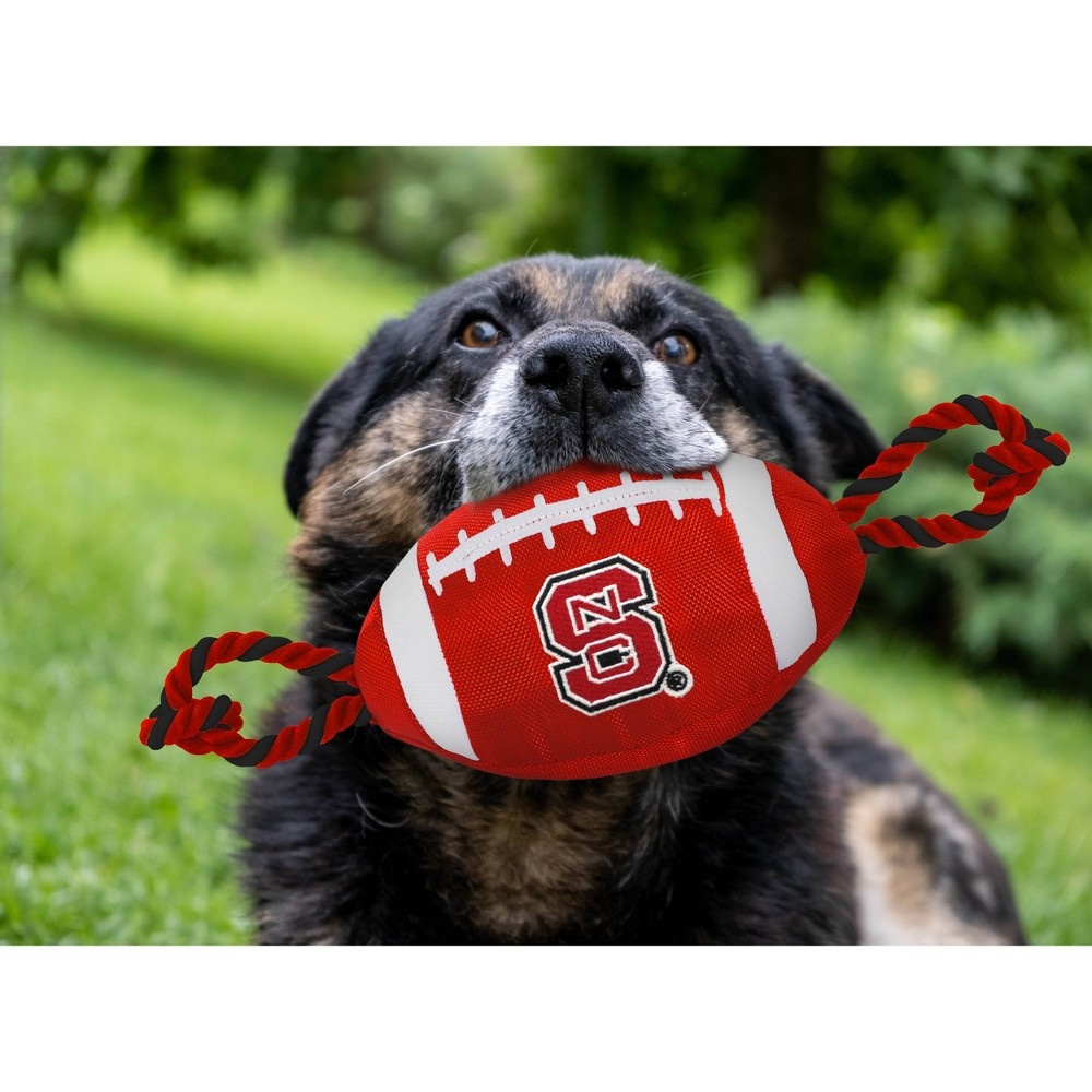 slide 2 of 2, NCAA NC State Wolfpack Nylon Football Dog Toy, 1 ct