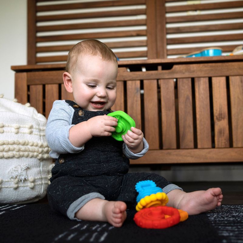 slide 3 of 12, Baby Einstein Stack & Teethe Multi-Textured Teether Toy, 1 ct