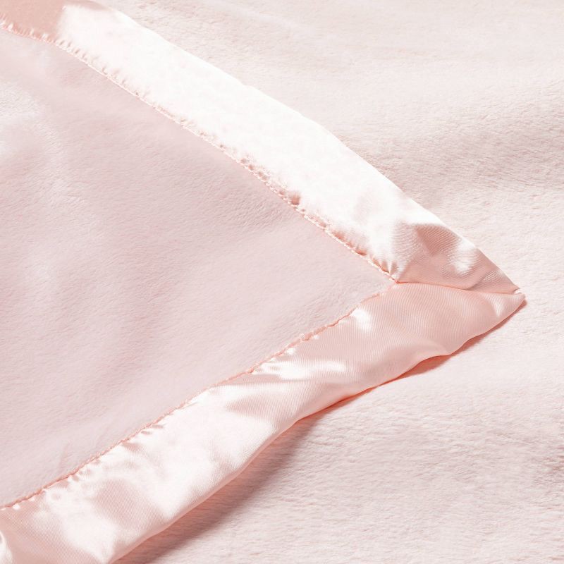 slide 3 of 4, Solid Satin Edge Plush Blanket - Cloud Island™ Pink, 1 ct