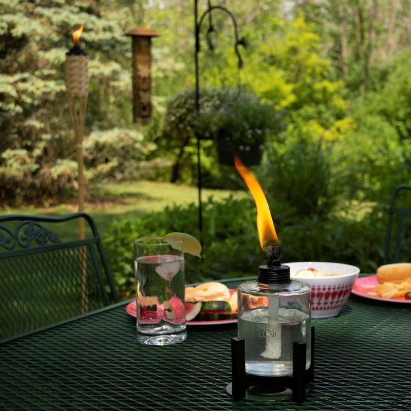 slide 4 of 5, TIKI Elevated Tall Glass Tabletop Outdoor Torch, 1 ct