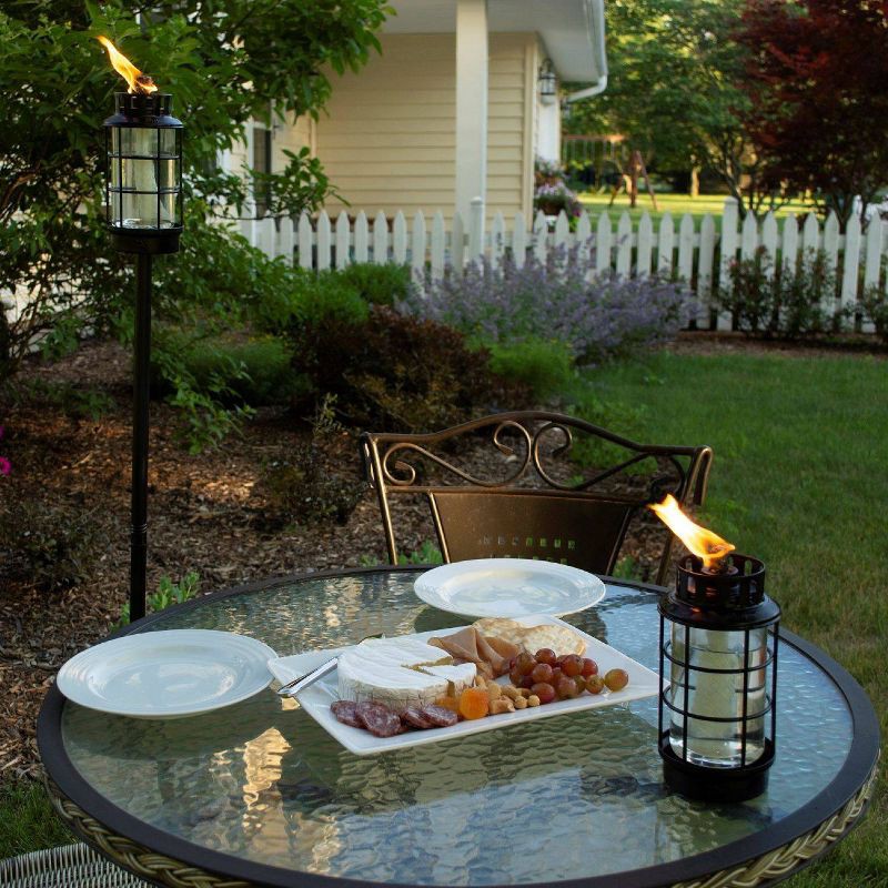 slide 3 of 4, TIKI Round Lantern StepNStall Outdoor Torch: Glass Stake Torches, Refillable, No Battery Needed, 1 ct