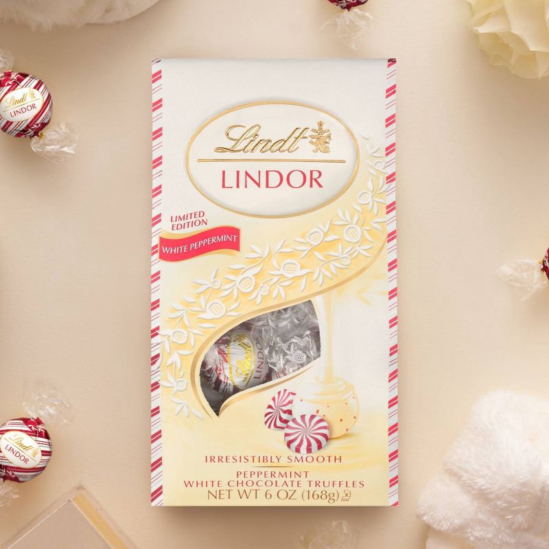 slide 11 of 13, Lindt LINDOR White Chocolate Candy Peppermint Truffles – 6oz, 6 oz