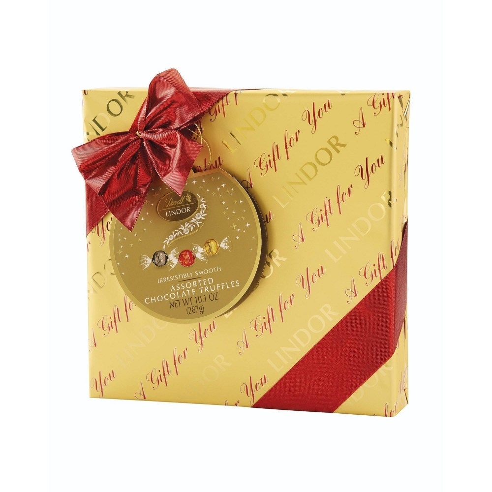 Lindt lindor milk and white chocolate christmas selection gift box, 227g: amazon.co.uk: grocery Lindt Holiday Wrapped Assorted Chocolate Gift Box 10.1 oz | Shipt