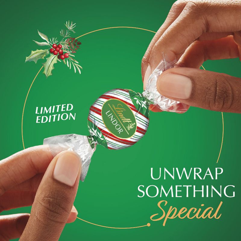 slide 4 of 12, Lindt LINDOR Christmas Limited Edition Peppermint Cookie Milk Chocolate Candy Truffles – 6oz, 6 oz