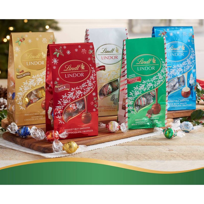 slide 9 of 12, Lindt LINDOR Christmas Limited Edition Peppermint Cookie Milk Chocolate Candy Truffles – 6oz, 6 oz