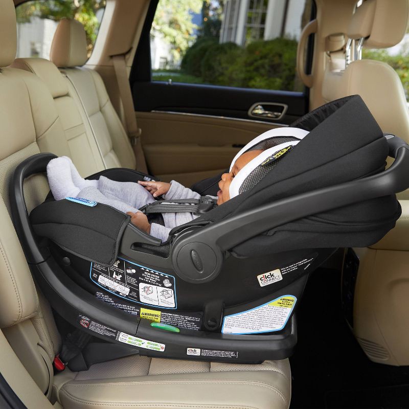 Graco SnugRide SnugFit 35 DLX Infant Car Seat Featuring Safety Surround