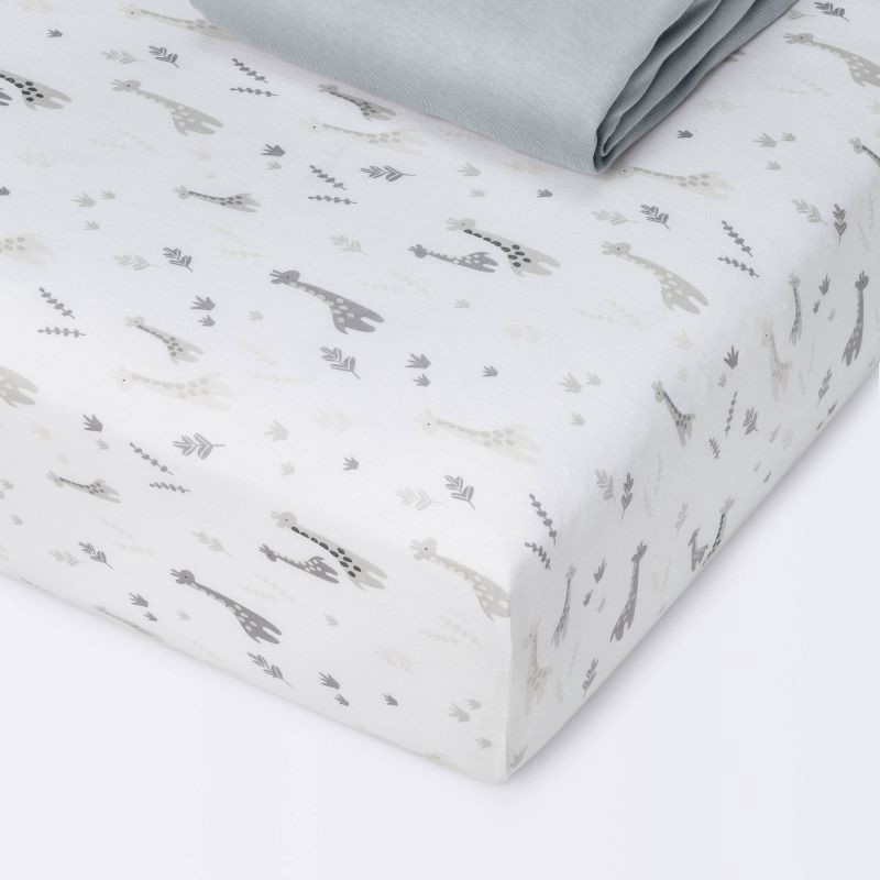 slide 1 of 4, Fitted Jersey Crib Sheet - Cloud Island™ Giraffes/Dark Gray 2pk, 2 ct