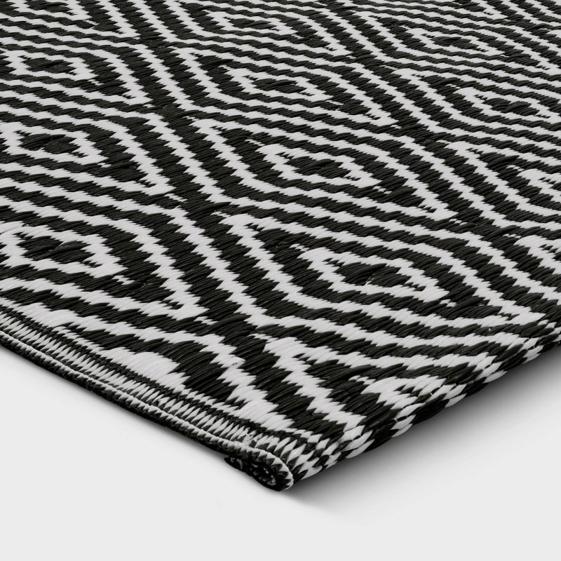 slide 3 of 3, 4'x6' Reversible Diamond Rectangular Loomed Indoor Outdoor Accent Rug Black - Room Essentials™, 1 ct