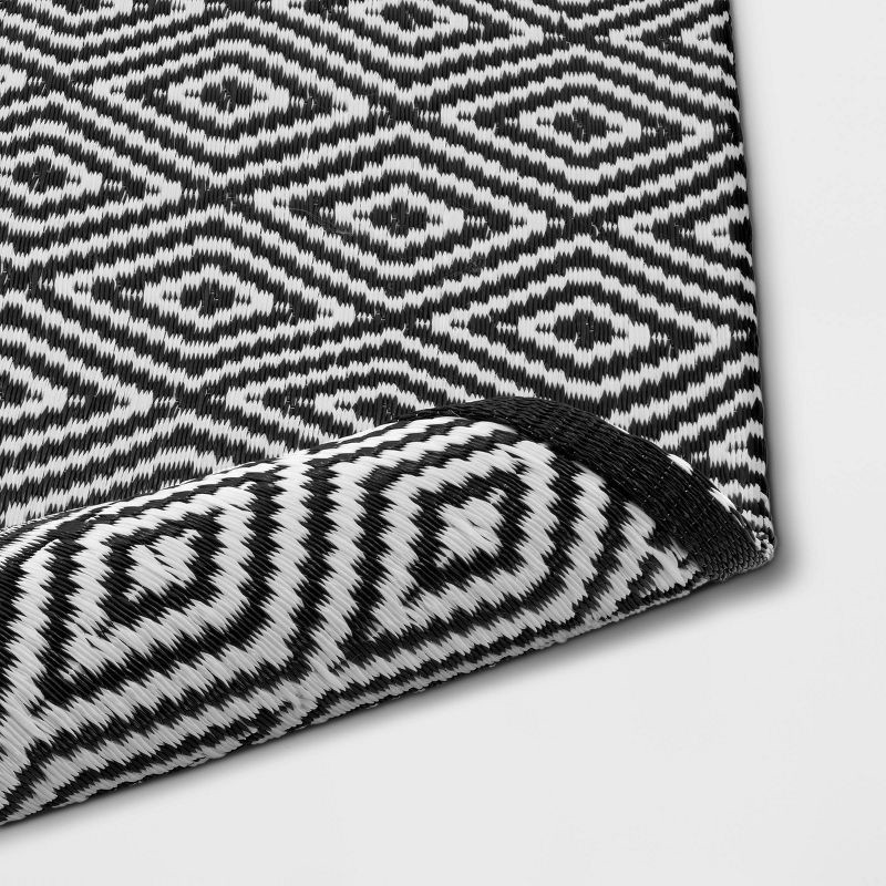 slide 2 of 3, 4'x6' Reversible Diamond Rectangular Loomed Indoor Outdoor Accent Rug Black - Room Essentials™, 1 ct