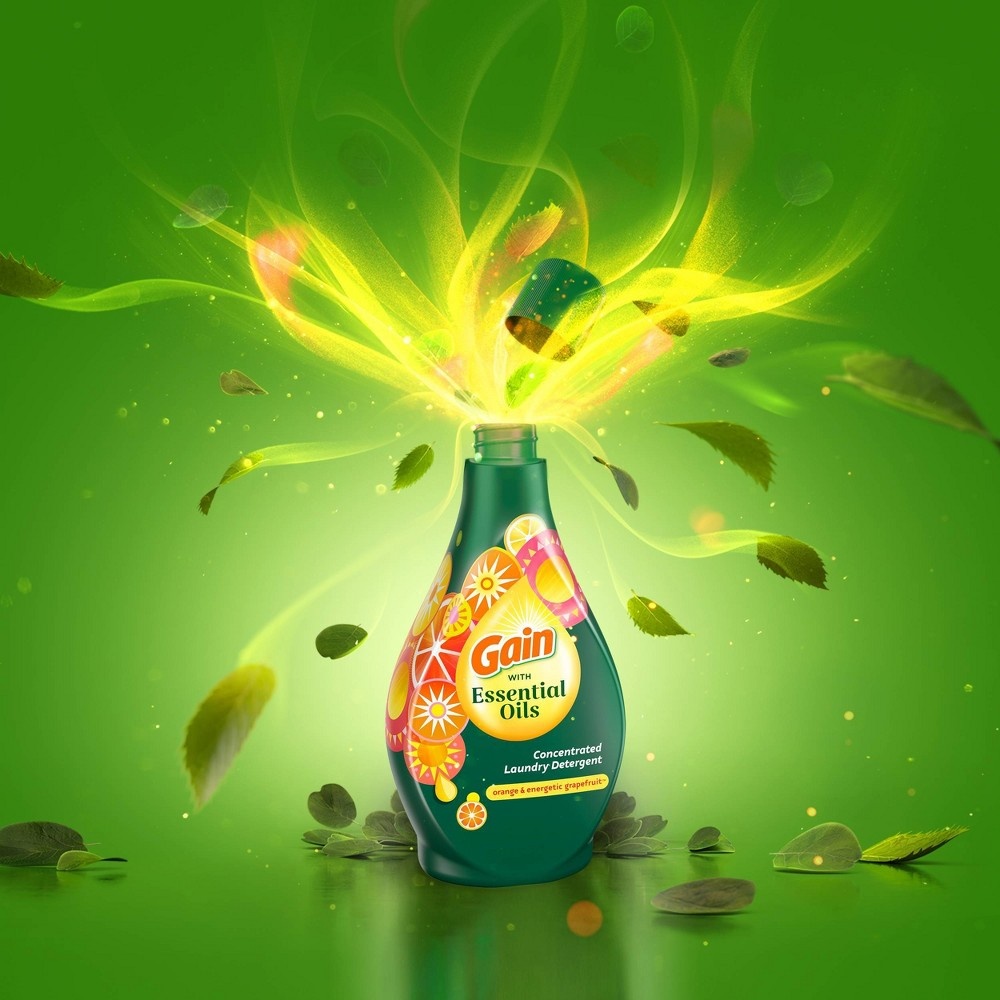 slide 4 of 8, Gain Essential Oils Orange & Energetic Grapefruit Liquid Laundry Detergent - The Uplifting Scent, 58 fl oz