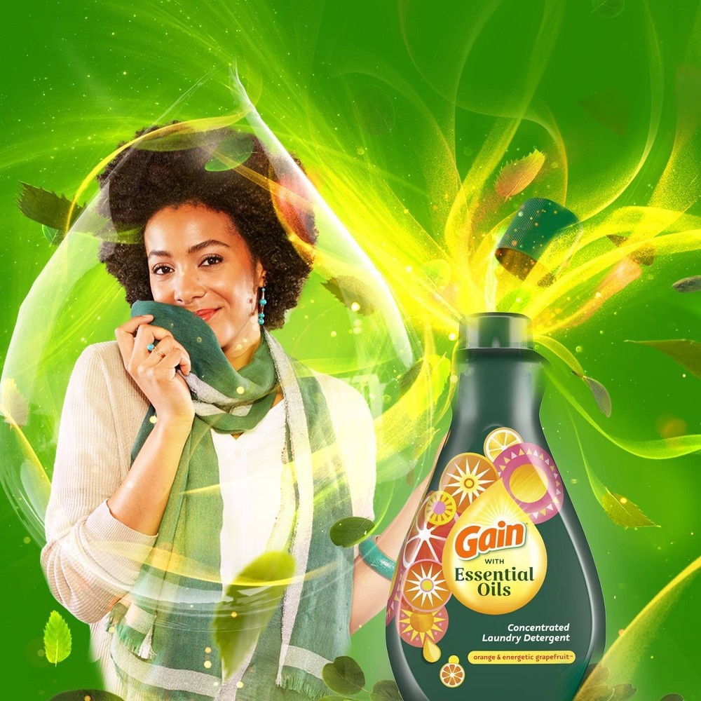 slide 5 of 8, Gain Essential Oils Orange & Energetic Grapefruit Liquid Laundry Detergent - The Uplifting Scent, 58 fl oz