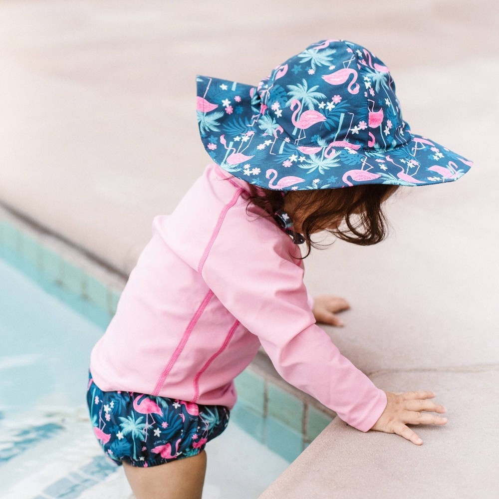 slide 4 of 4, green sprouts Toddler Girls' Tropical Flamingos Pull-Up Absorbent Reusable Swim Diaper - Navy 12-18M, 1 ct