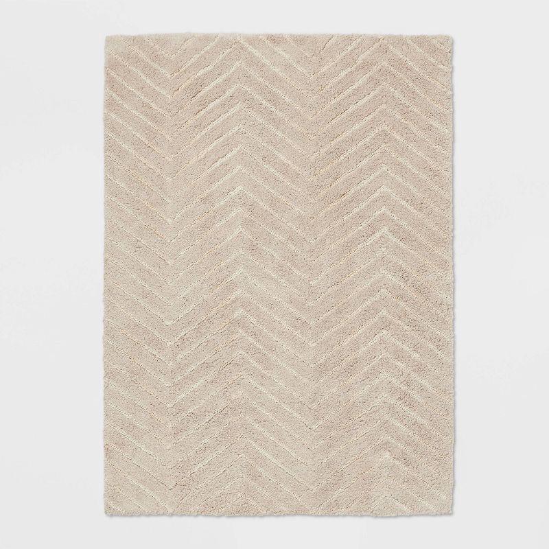 slide 1 of 4, 4'x5'6" Tufted Cotton Chevron Kids' Rug Beige - Pillowfort™, 1 ct
