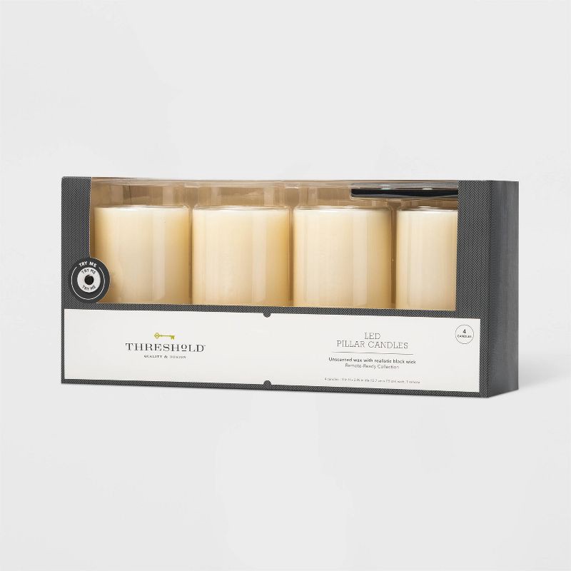 slide 1 of 3, 4pk 5" x 3" LED Flameless Black Wick Candle Cream - Threshold™: Wax Pillar Decor, Battery Operated, Safe Ambiance, 4 ct