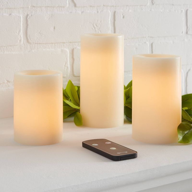 slide 2 of 3, 3pk 3'' x 4'' 3'' x 5'' 3'' x 6'' LED Flameless Black Wick Candle Cream - Threshold™, 3 ct