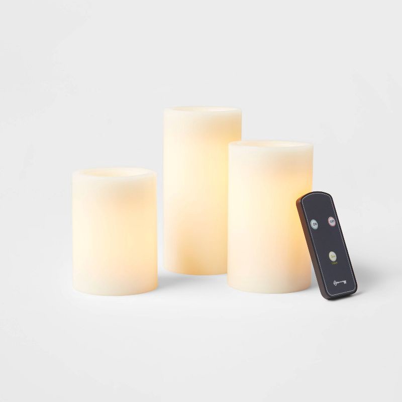slide 3 of 3, 3pk 3'' x 4'' 3'' x 5'' 3'' x 6'' LED Flameless Black Wick Candle Cream - Threshold™, 3 ct