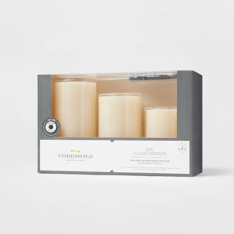 slide 1 of 3, 3pk 3'' x 4'' 3'' x 5'' 3'' x 6'' LED Flameless Black Wick Candle Cream - Threshold™, 3 ct