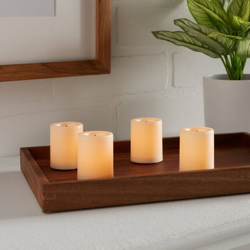 slide 2 of 3, 1.82" x 1.4" 4pk LED Votive Flameless Black Wick Candle Cream - Threshold™: Tea Lights, Safe Decor, 4 ct