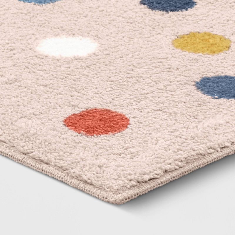 slide 3 of 5, 4'x5'6" Multi Dot Kids' Rug Pink - Pillowfort™: Tufted Polka Dot Accent for Kids Room, OEKO-TEX Certified, 1 ct
