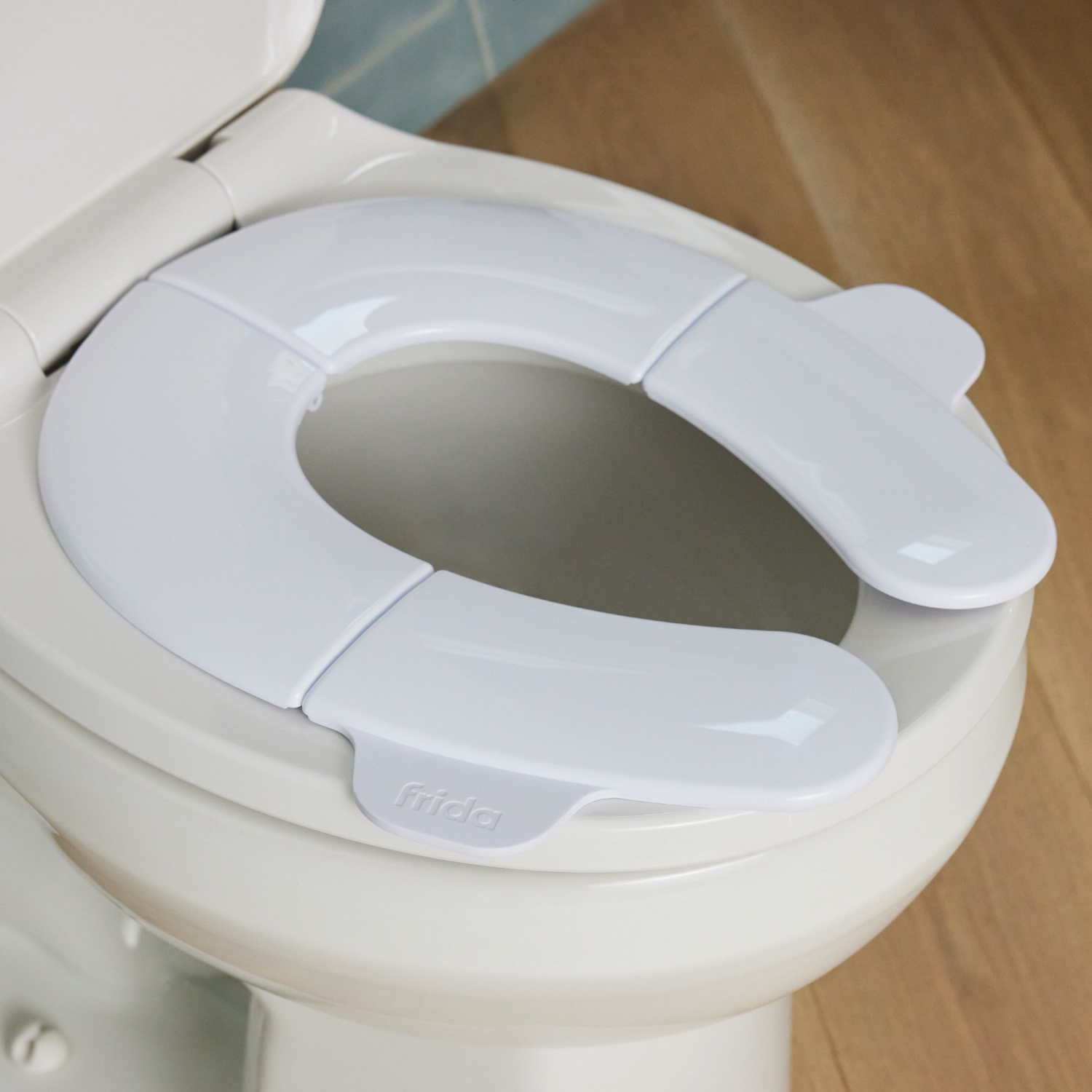 slide 2 of 2, FRIDABABY Frida Baby Fold-And-Go Potty Seat, 1 ct