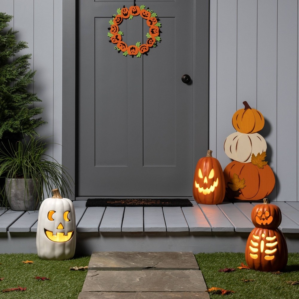 slide 2 of 3, Lit Double Stack Pumpkin with Skeleton Halloween Decorative Prop - Hyde & EEK! Boutique, 1 ct